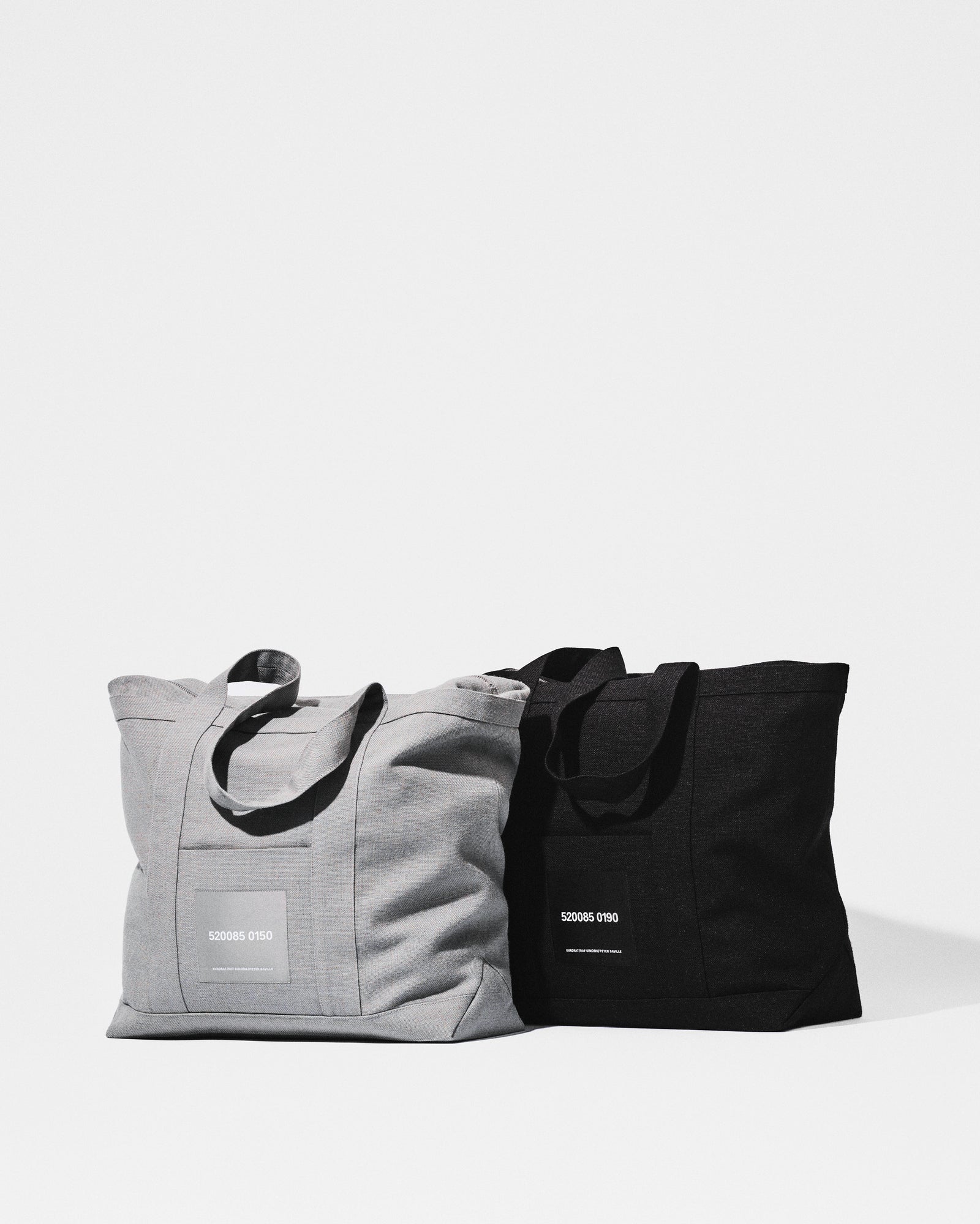 kvadrat raf simons peter saville grey black tote bag
